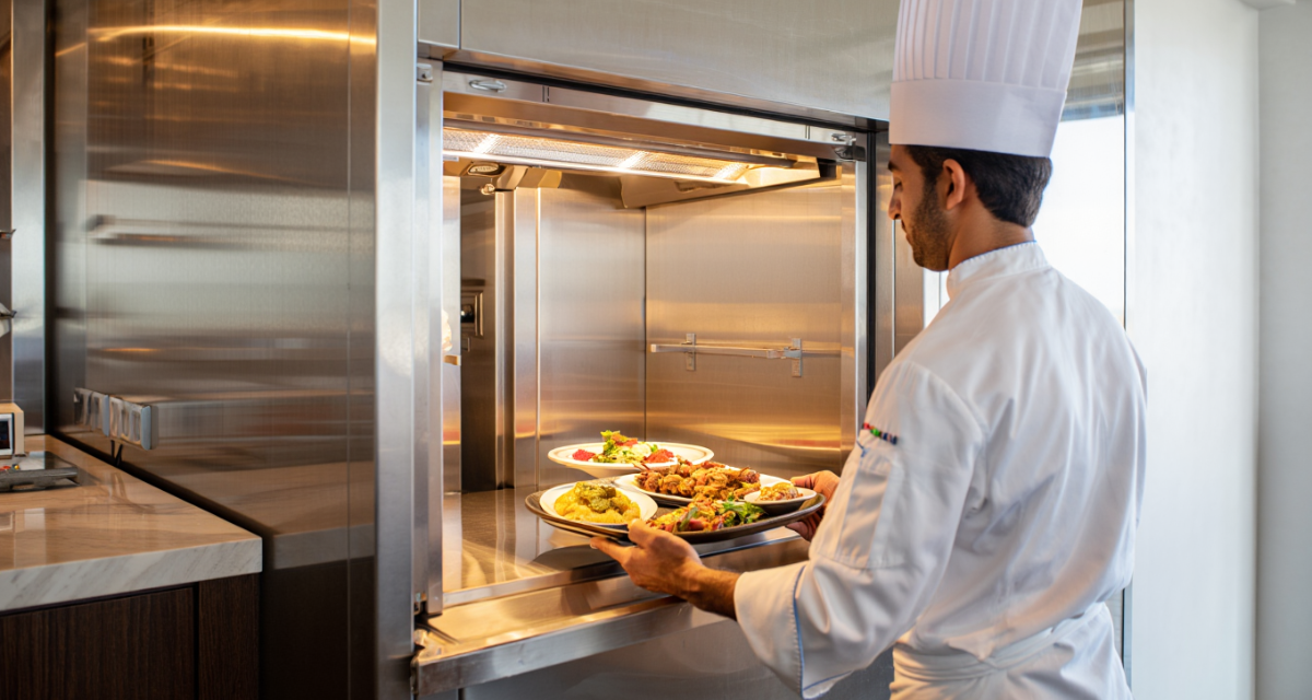 Modern dumbwaiter lift installed in a UAE restaurant and luxury villa, providing efficient vertical transportation of food, groceries, and household items between floors.