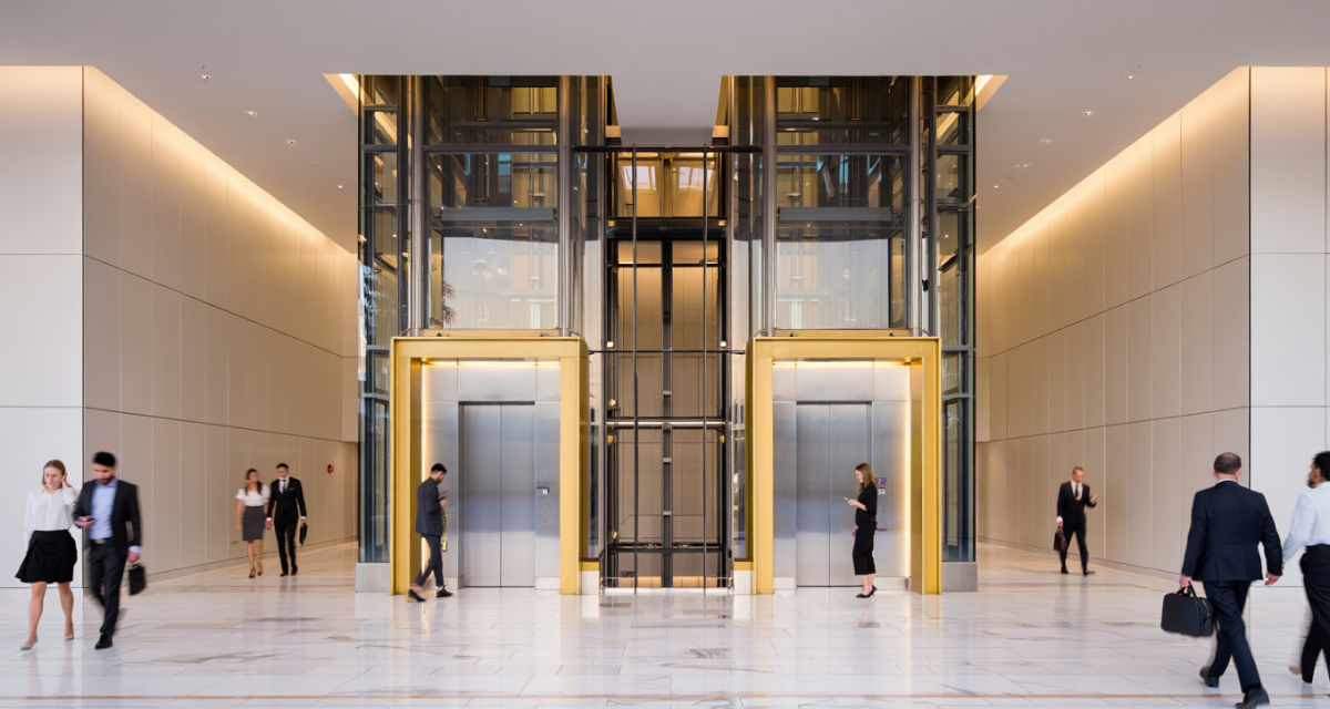Modern passenger elevators in UAE installed inside a commercial office building with sleek interior design
